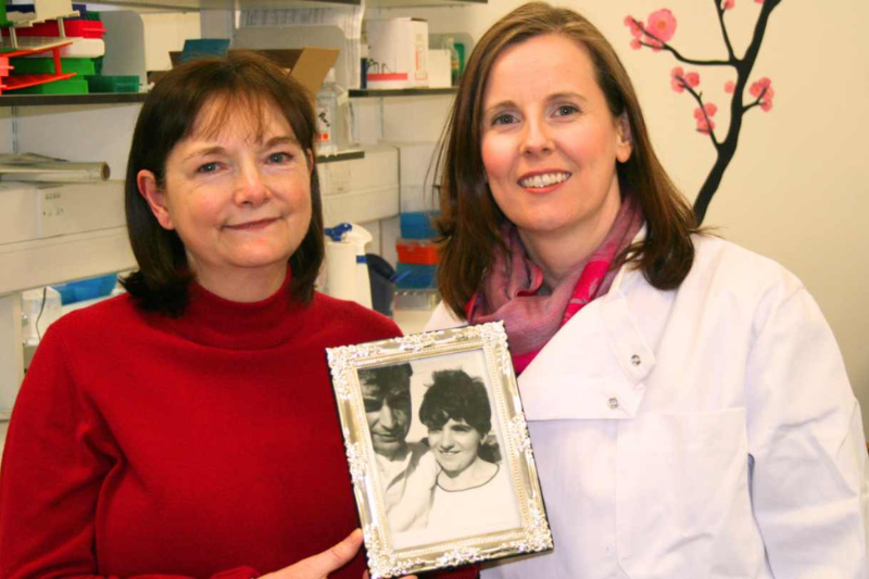 Caroline Jamison pictured with Prof Denise Fitzgerald holding a photo of her mum and dad